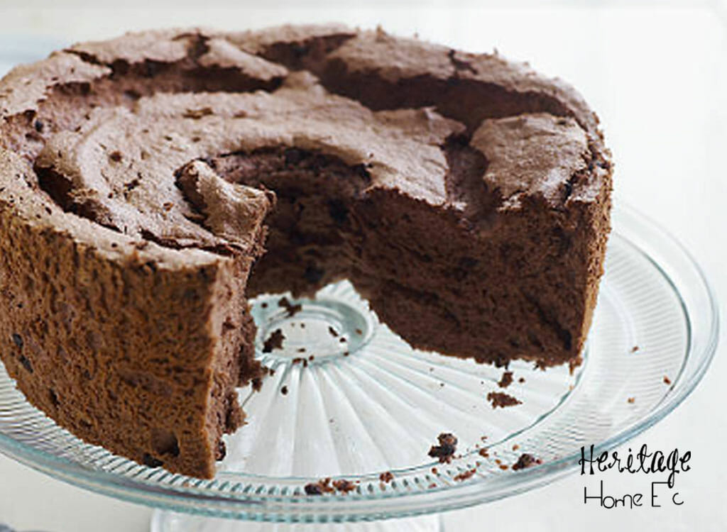Chocolate Angel Food Cake- Heritage Home Ec Chocolate Angel Food Cake is a compromise between my husband and myself. He hates Angel Food; I love it. By making this version with chocolate added, we both get something that we like for dessert. | Chocolate Angel Food Cake | Baking | Cake | Homemade | Homemaking |