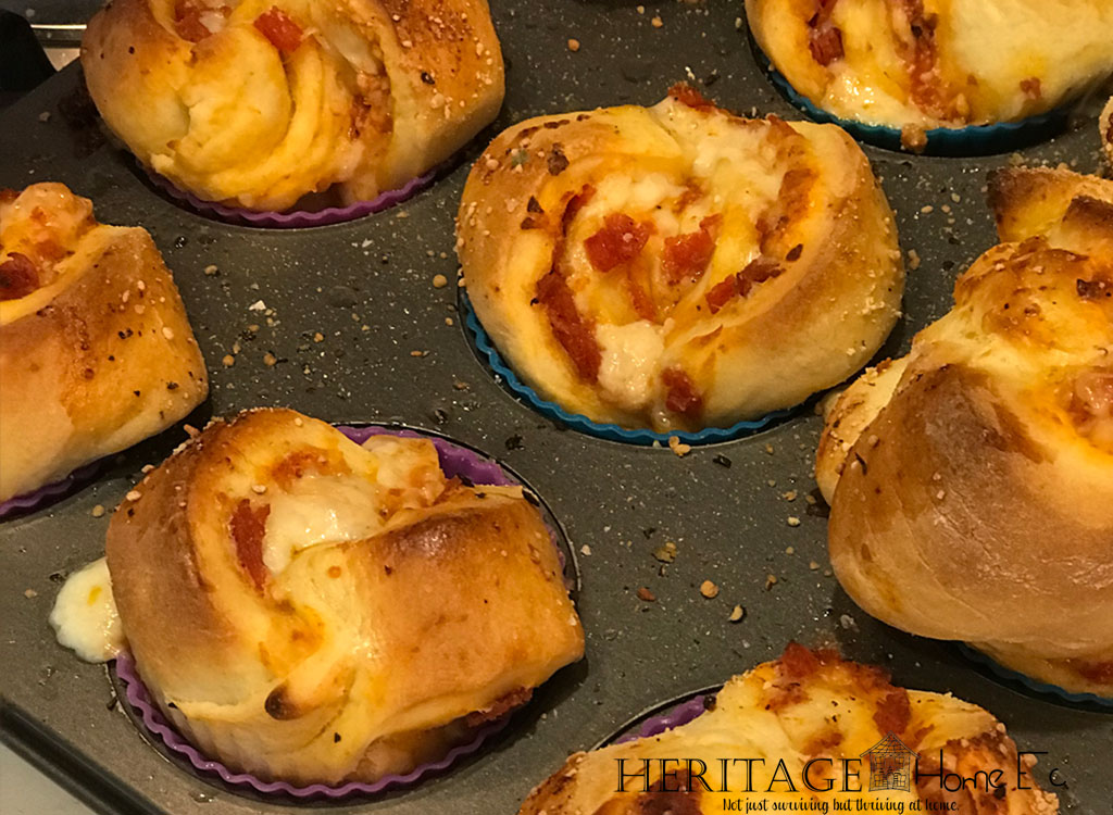 Pepperoni Pizza Babka Muffins- Heritage Home Ec I love portable foods. These Pepperoni Pizza Babka Muffins are sure to be a family favorite once you try them. Kid-friendly and family approved! | Kid-Friendly | Baking and Breads | Snacks | Main Dishes | Pizza Muffins |