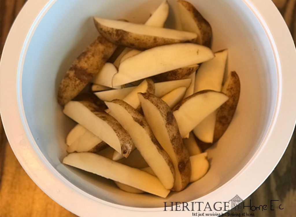 DIY Crispy Frozen French Fries- Heritage Home Ec Start using real potatoes to make Crispy Frozen French Fries to stock your freezer instead of grabbing them from the freezer section. | Freezing & Preserving | Homemade | Homemaking | Food | DIY | Recipe |