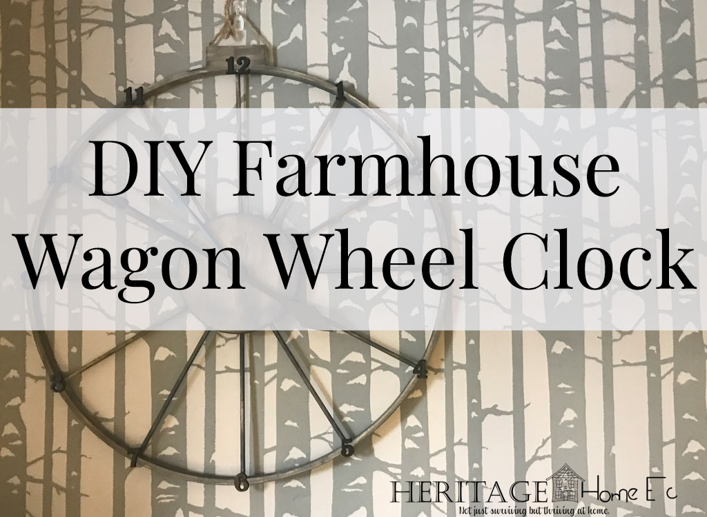 DIY Farmhouse Wagon Wheel Clock from Embroidery Hoops- Heritage Home Ec Creating Farmhouse decor on your to-do list? Why not create this simple DIY Farmhouse Wagon Wheel Clock for your wall today? | DIY Home Decor | Homemaking | Crafts | Home Economics |
