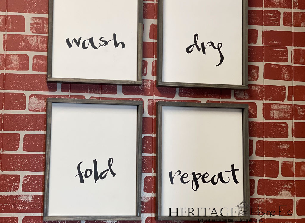 wash dry fold repeat signs on faux brick background