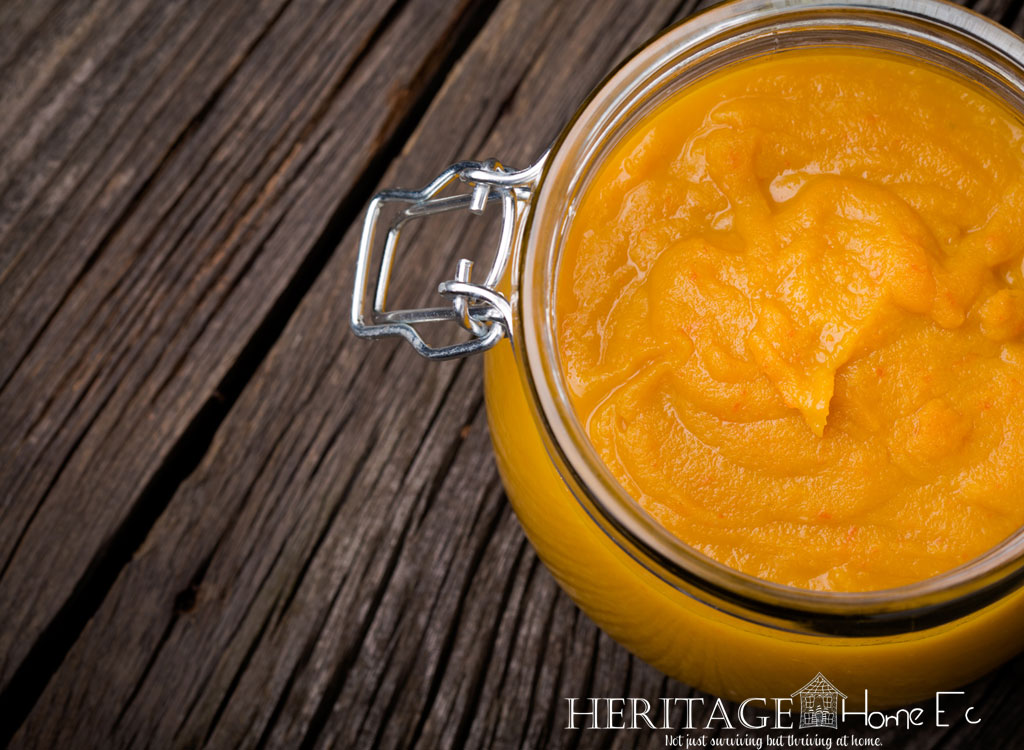 pretty homemade habanero mango hot sauce overhead in glass jar