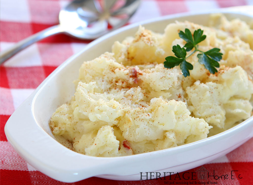 potato salad in dish on red check table cloth