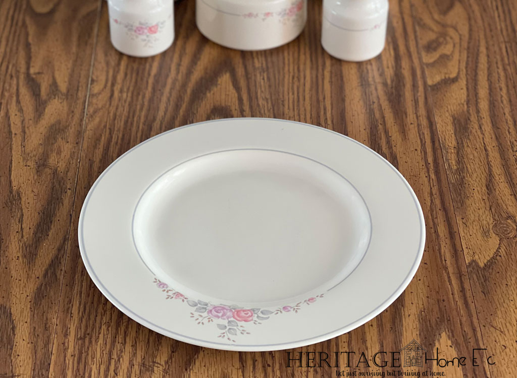 simple floral dinner plate on a wooden table