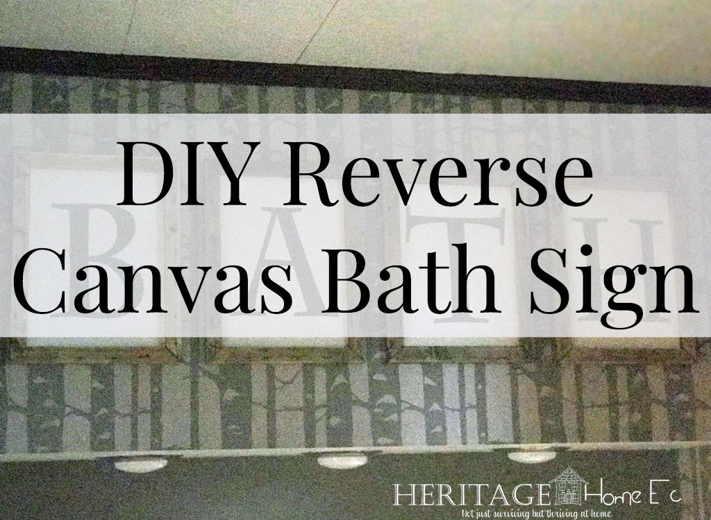 DIY Reverse Canvas Bath Sign- Heritage Home Ec Need a custom piece to break up a blank wall but don't want to mismatch your decor? This DIY Reverse Canvas Bath Sign could be the answer. | DIY | Home Decor | Crafts | Signs | Home Economics |