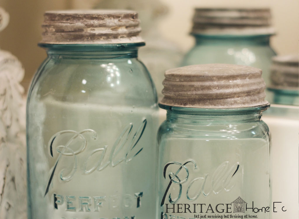 vintage blue canning jars with brown screw on lids