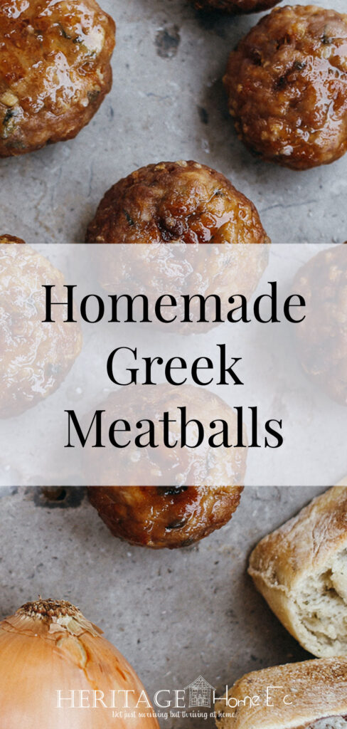 Homemade Greek Meatballs- Heritage Home Ec These Homemade Greek Meatballs are perfect used as game day food, in Homemade Gyros, or just by themselves with a side of Greek Salad. | Recipes | Food | Greek | Meatballs | Dinner | Freezer Cooking | #dinner #mealplan #recipe #recipes #food #meatballs #freezercooking #homemade #homeec #homeeconomics #homecooking #greek #greekmeatballs